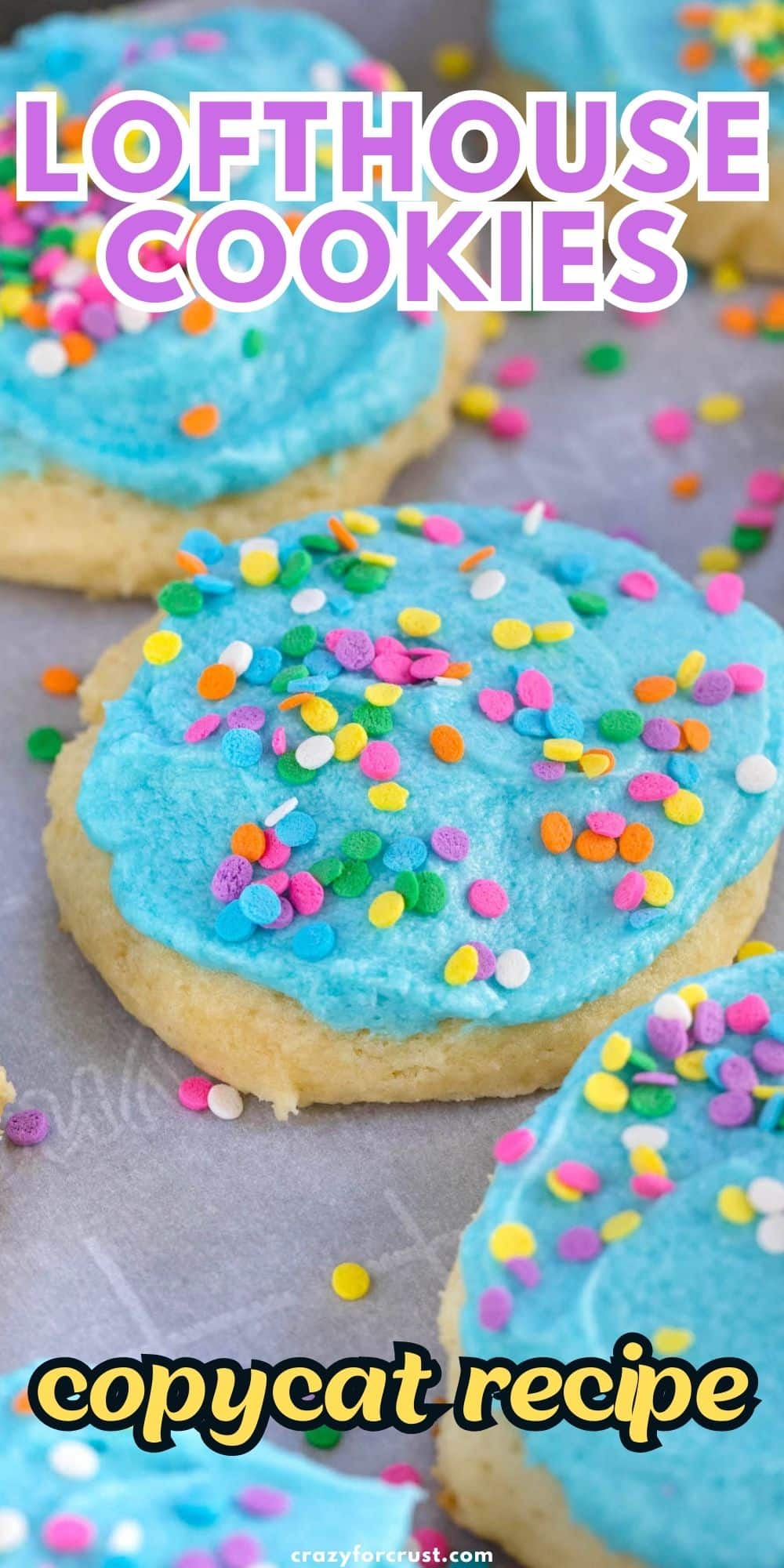 blue frosted cookie with sprinkles and words on photo