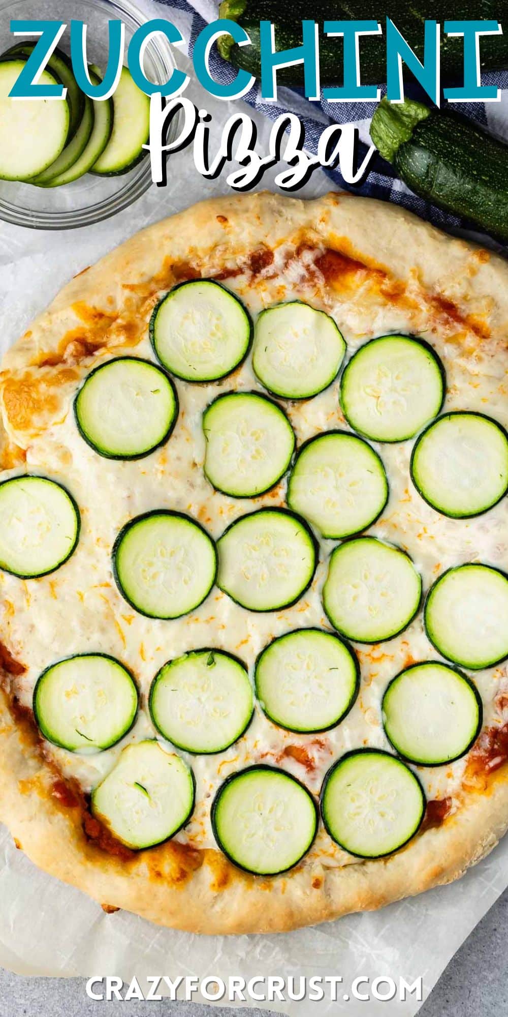 pizza with sliced zucchinis on top with words on the image.
