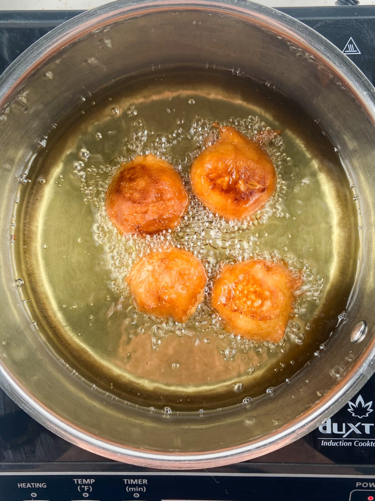 process shot of no bake cheesecake truffles.