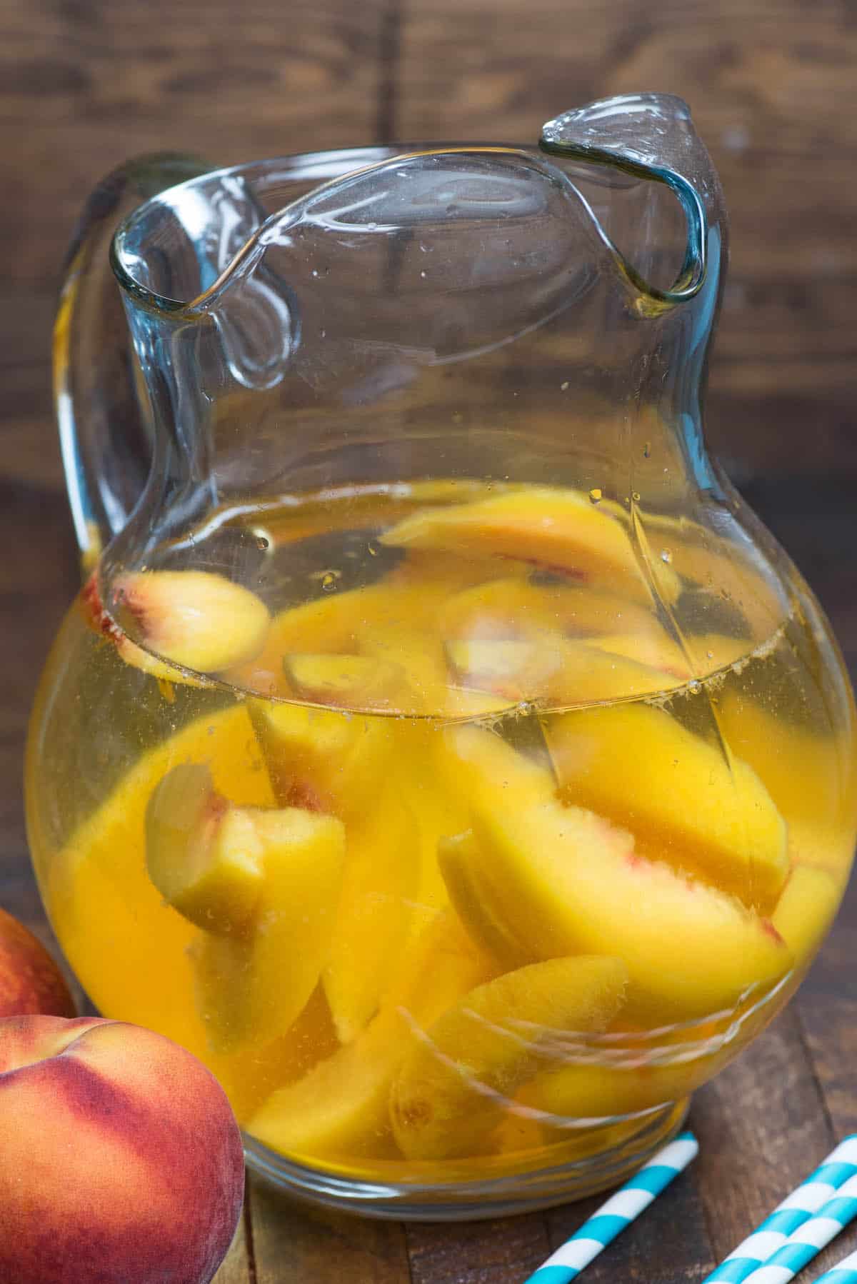pitcher of sangria with peaches