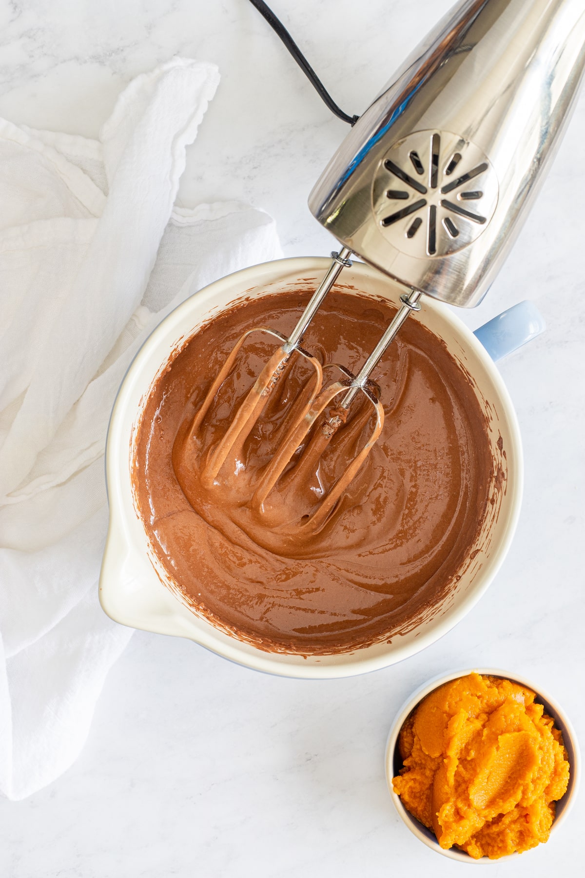 process shot of pumpkin chocolate cupcakes.