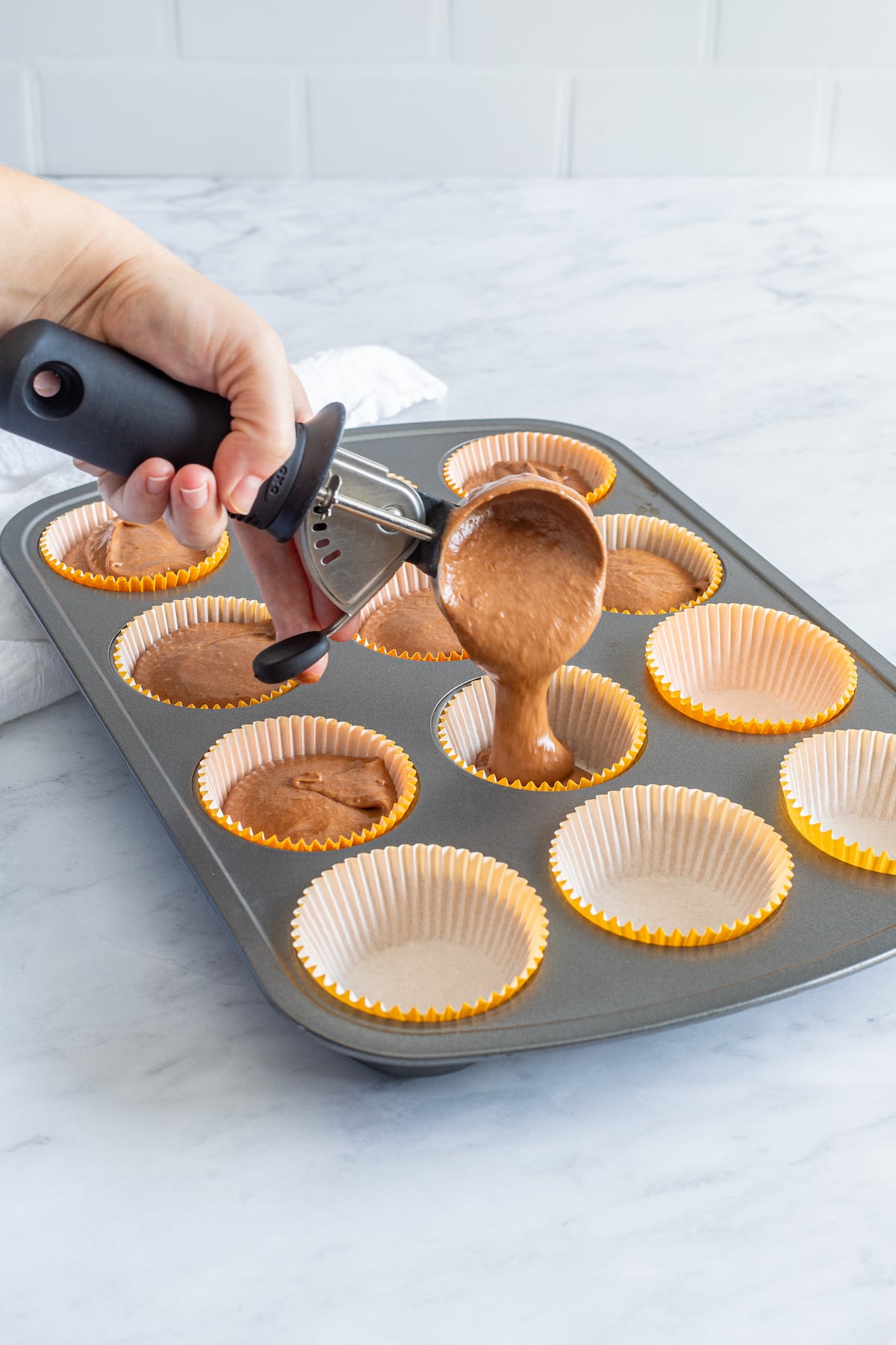 process shot of pumpkin chocolate cupcakes.