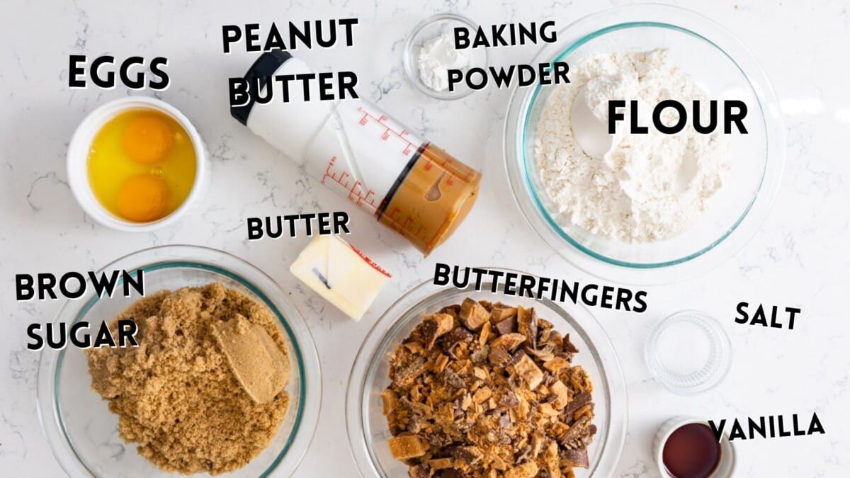 ingredients in butterfinger blondies laid out on marble countertop.