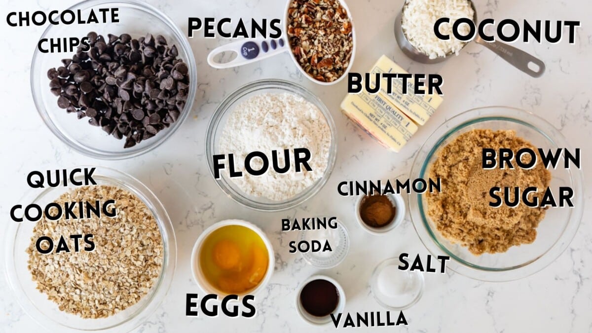 ingredients in cowboy cookies laid out on a marble counter.