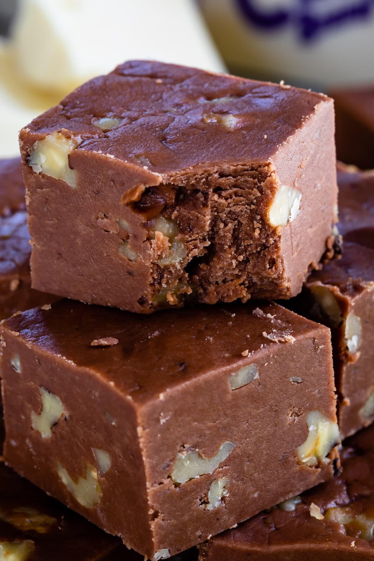 stack of fudge with one having a bite missing.