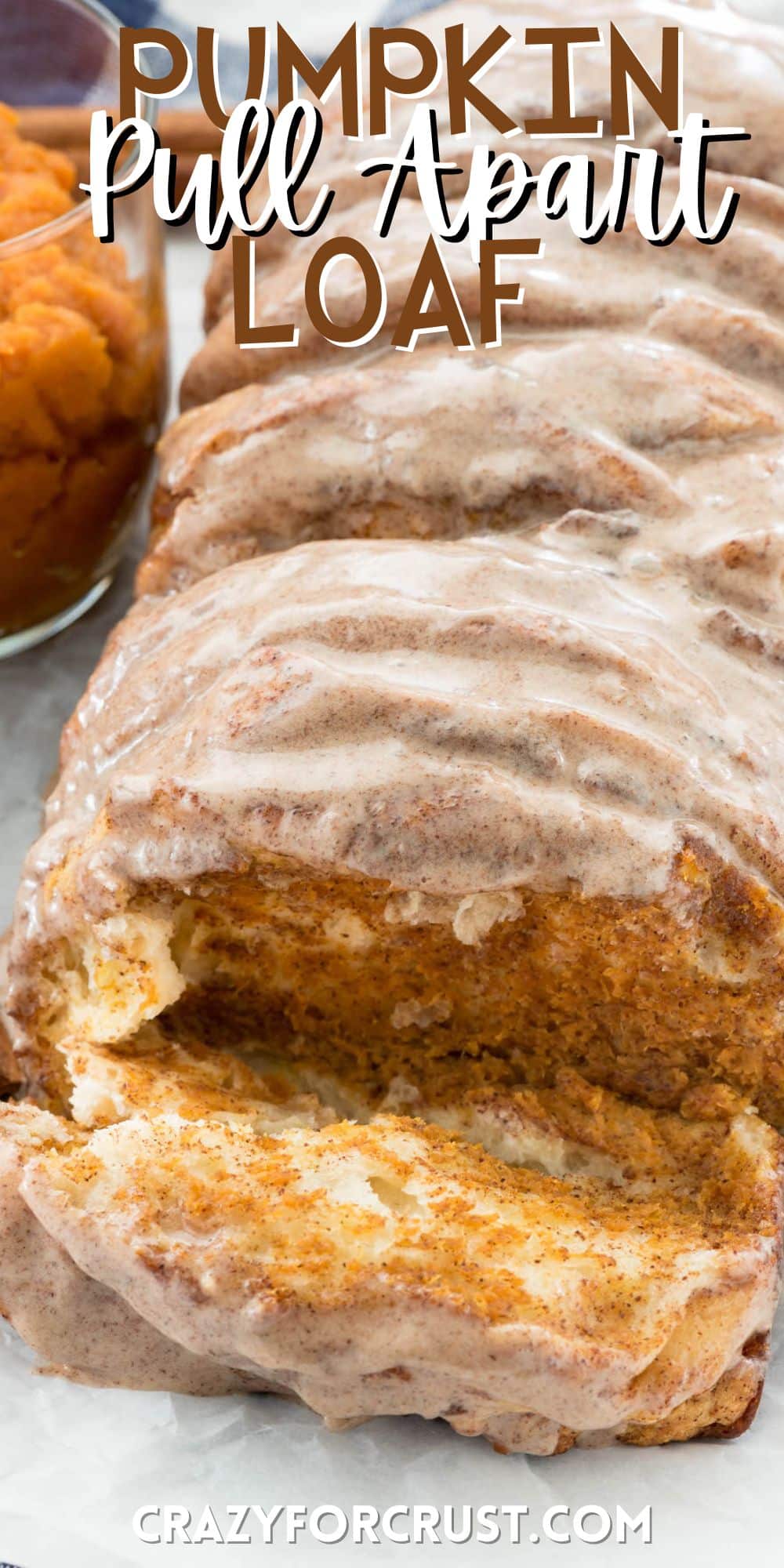 pumpkin pull apart loaf that sliced in front with words on the image.