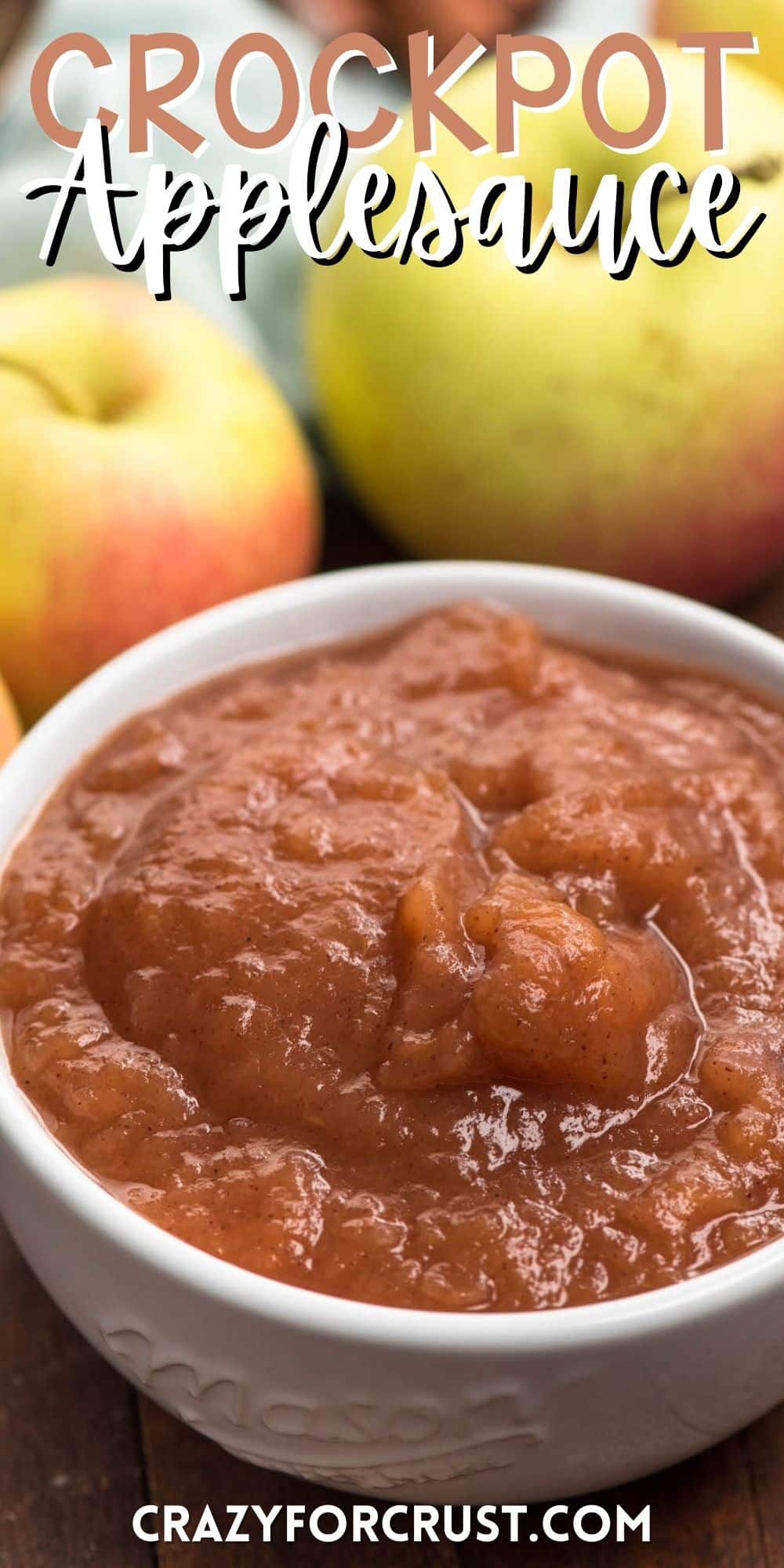 crockpot applesauce in a white bowl with words on the image.