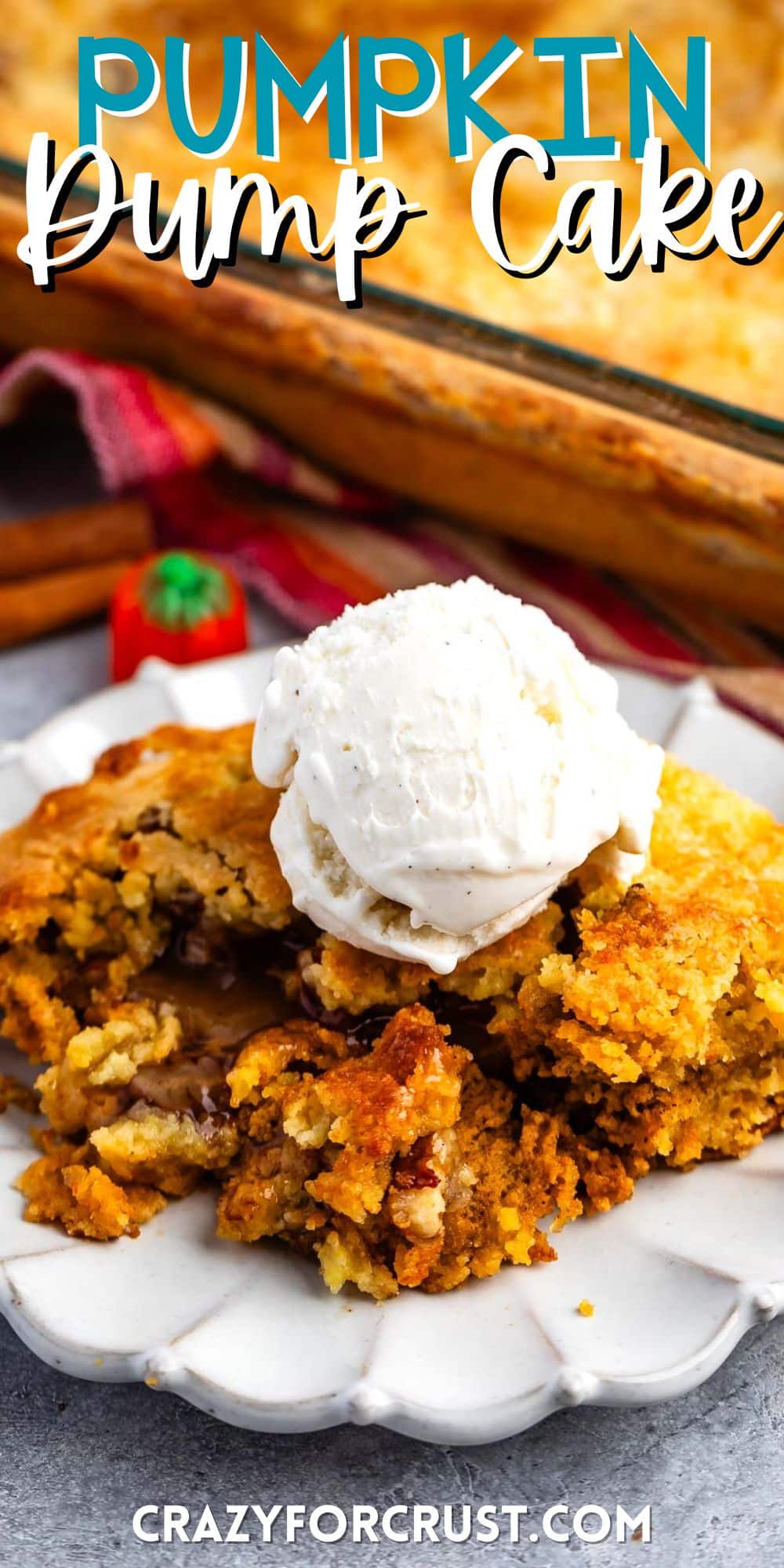 dump cake on a grey plate with ice cream scoop on top with words on the image.