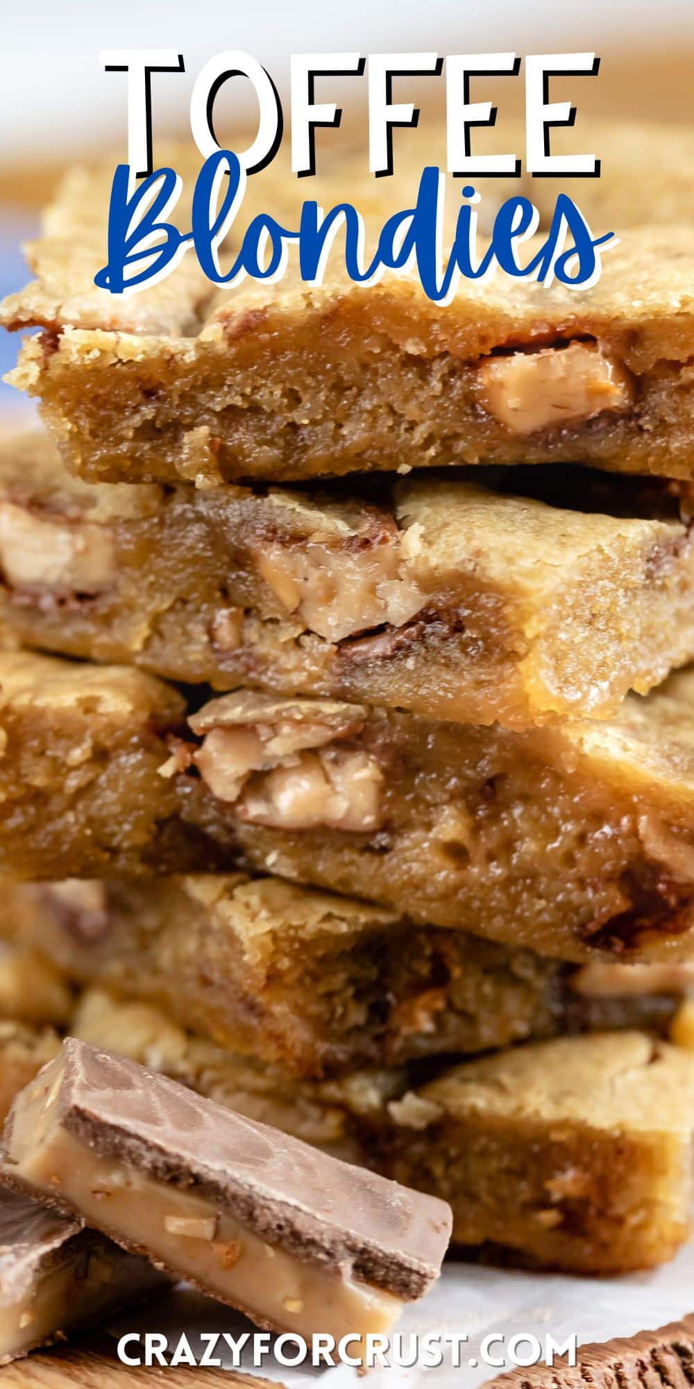 stacked blondies with toffee bits baked in with words on the image.