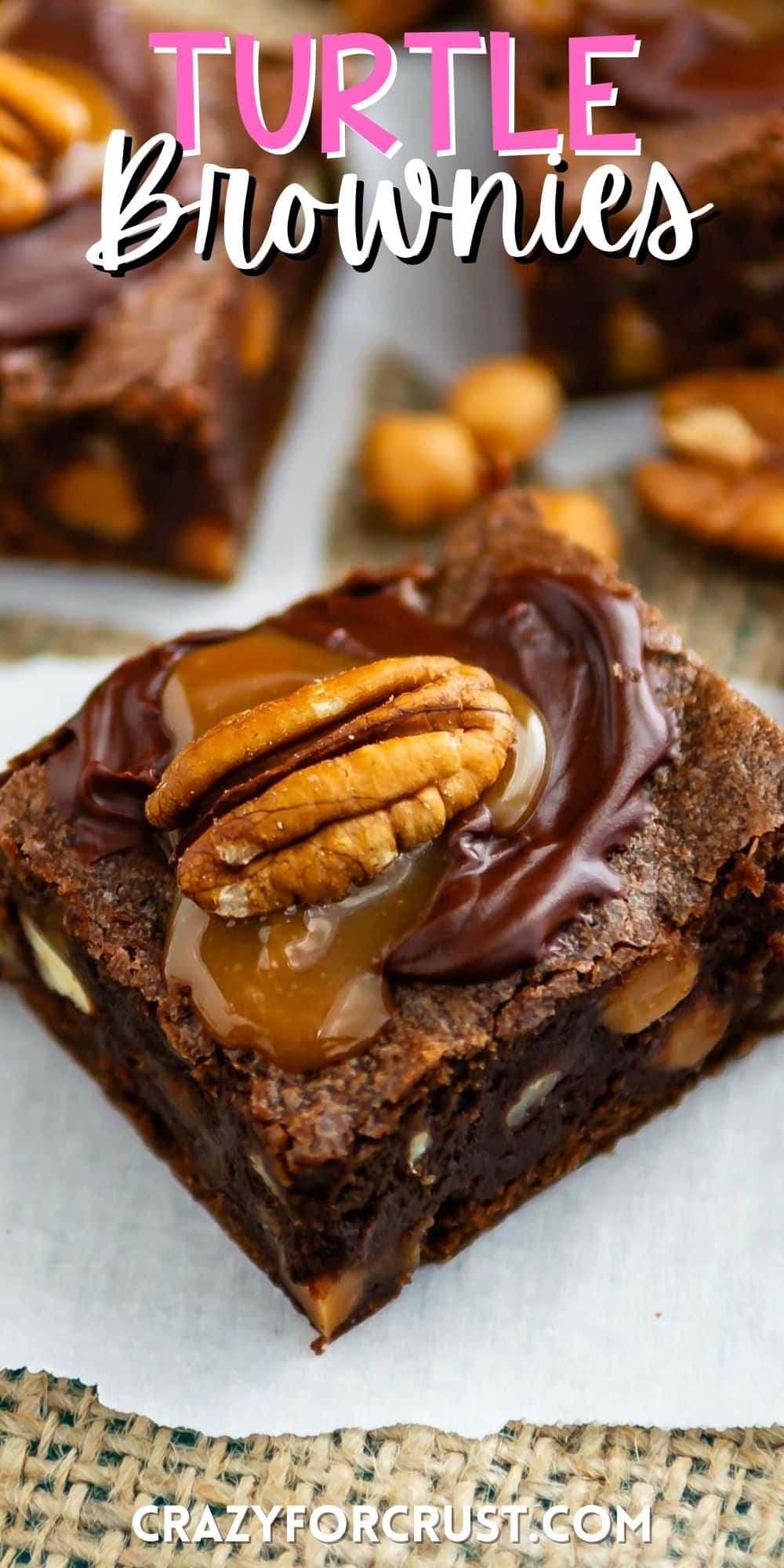 brownies with caramel and a pecan on top with words on the image.
