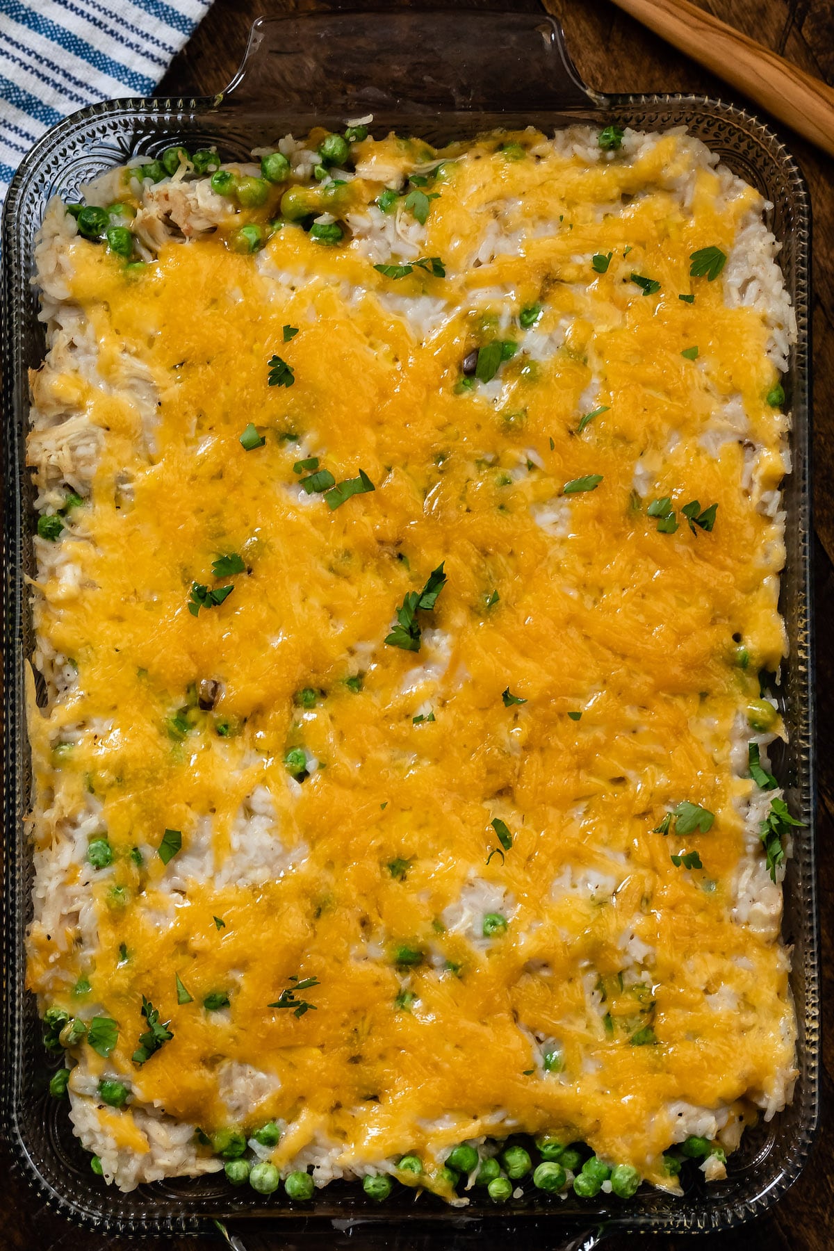 chicken and rice casserole in a clear casserole pan.
