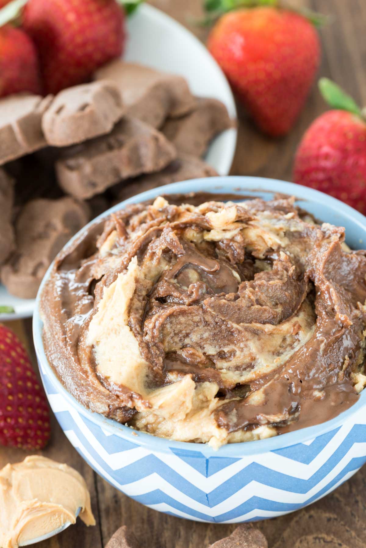 peanut butter and chocolate dip in a blue and white bowl.