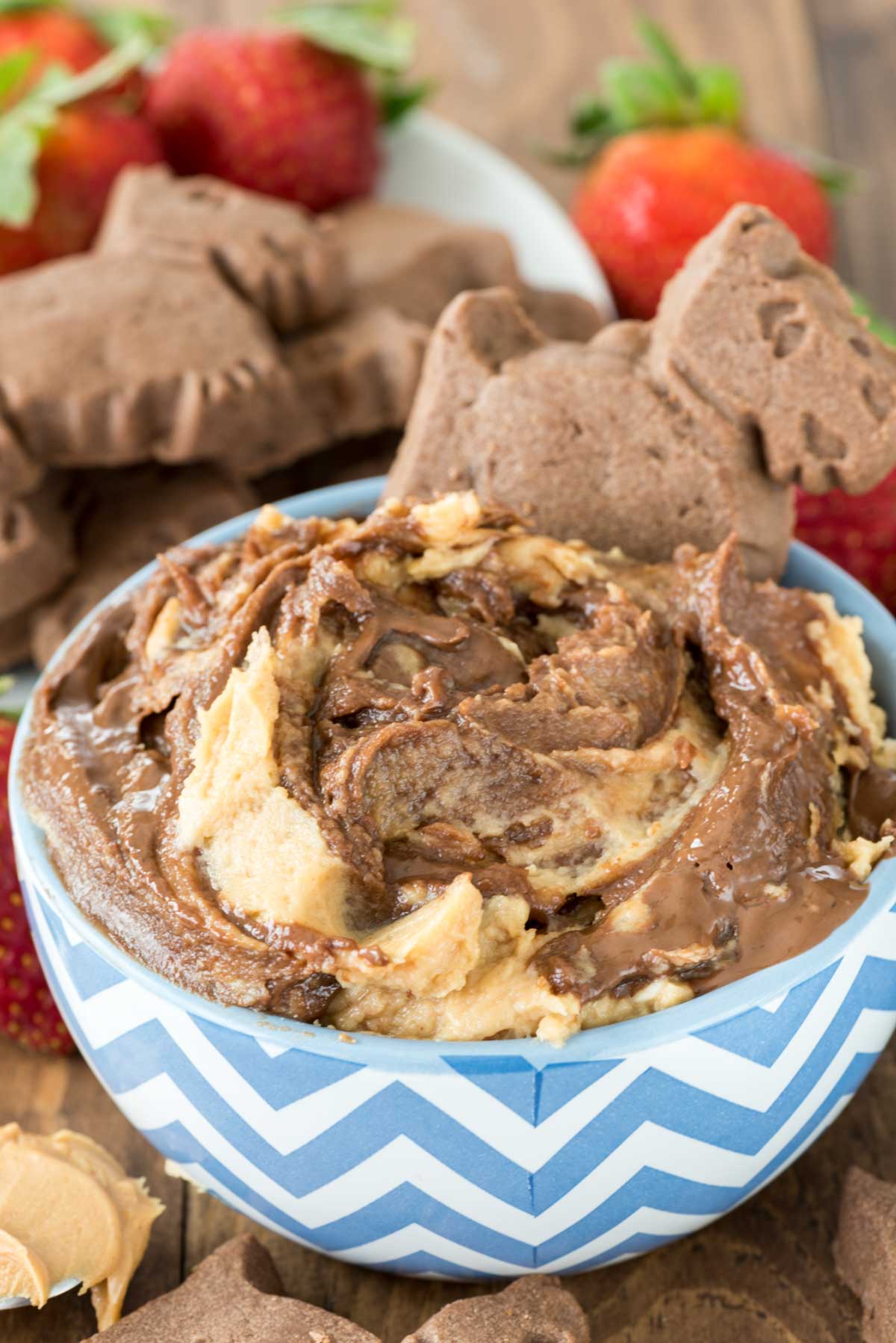 peanut butter and chocolate dip in a blue and white bowl.