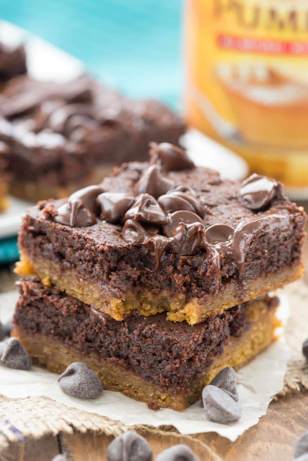 stacked brownies with chocolate chips baked in on top.