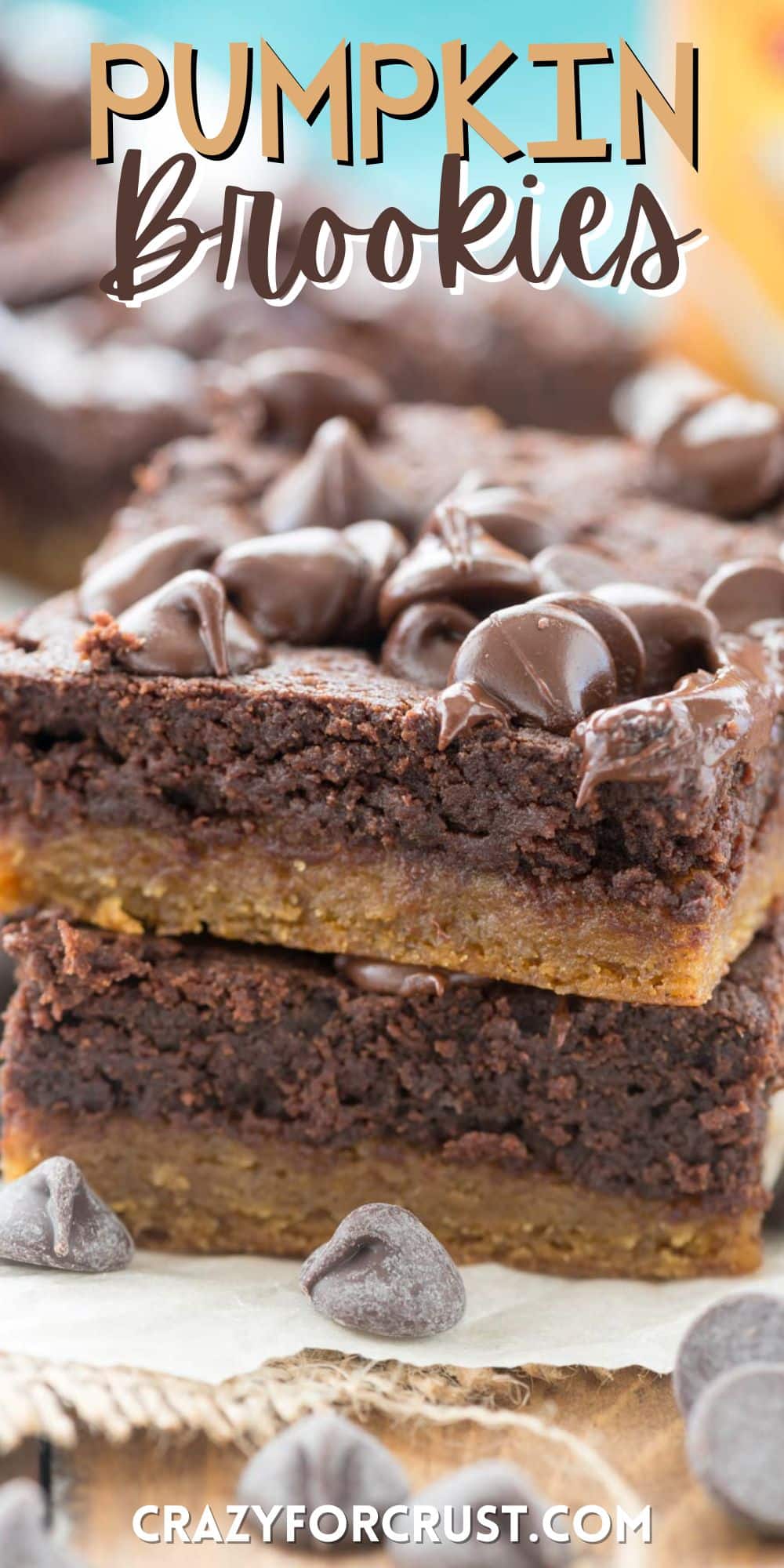 stacked brownies with chocolate chips baked in on top with words on the image.