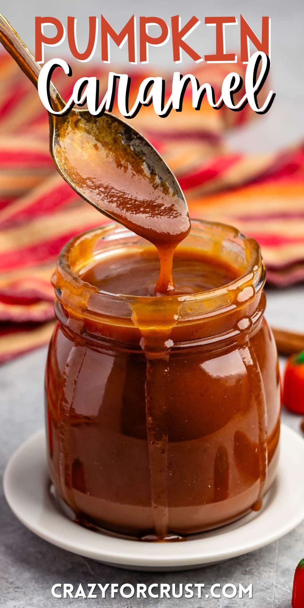 caramel in a clear jar with a spoon scooping it with words on the image.