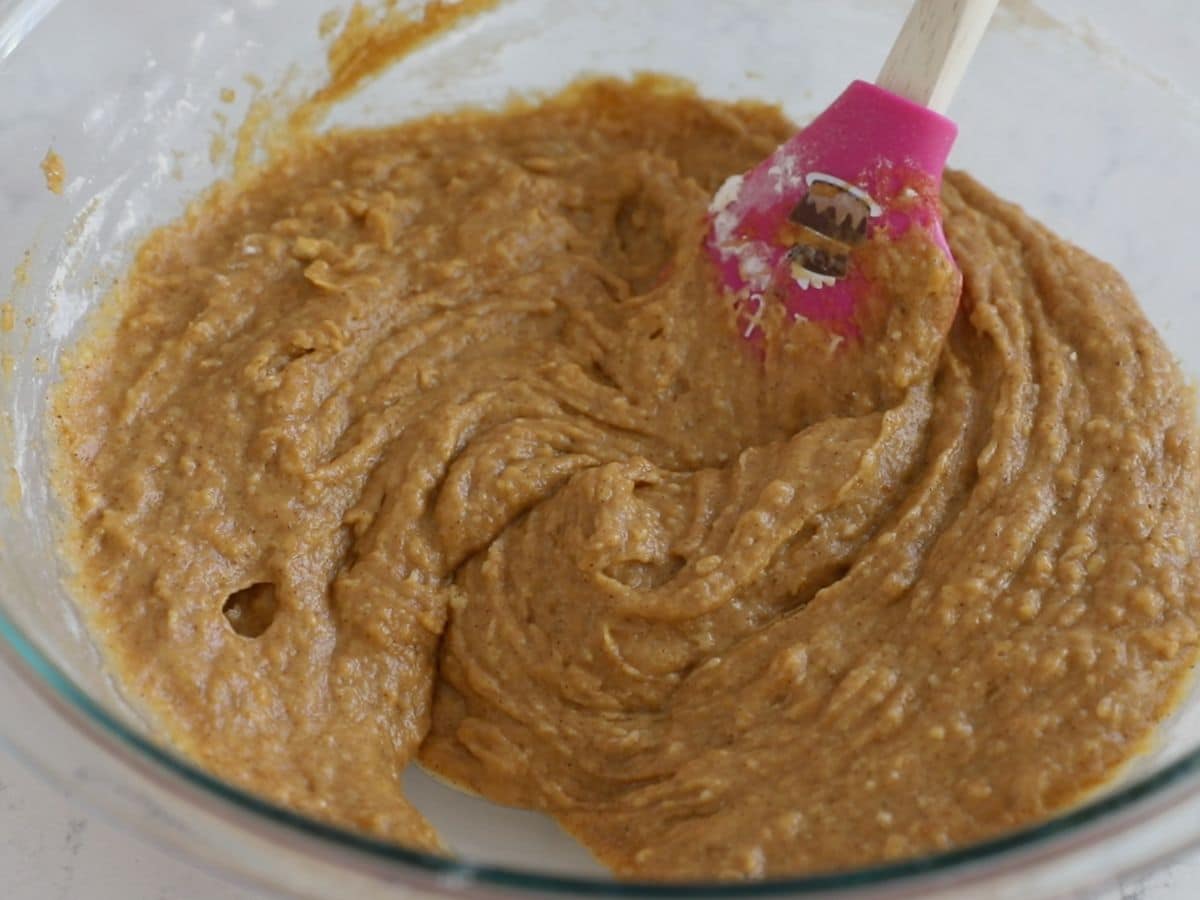 process shot of pumpkin cream cheese muffins.