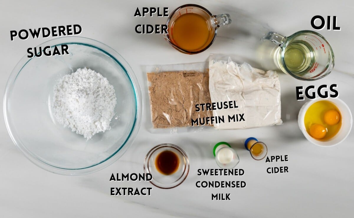 ingredients in apple fritter coffee cake laid out on a marble counter.