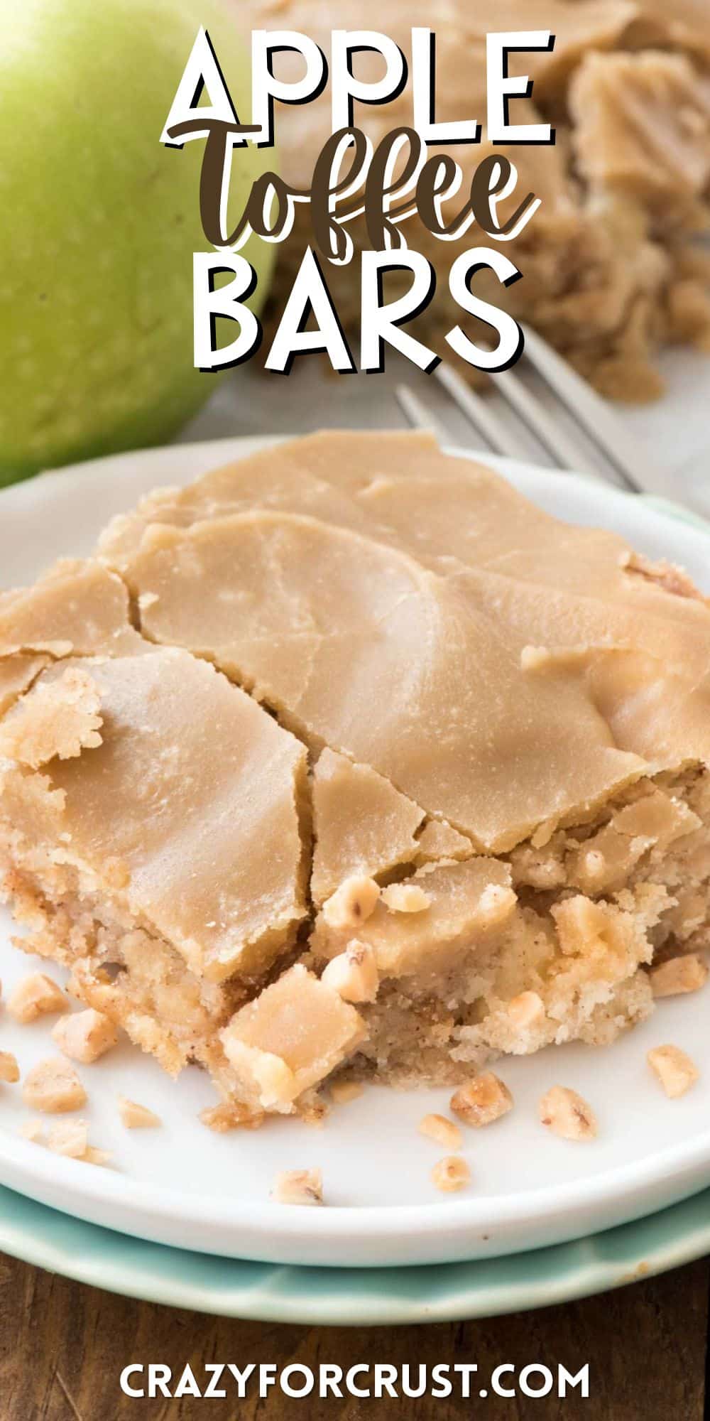 square slice of apple bar on a white plate with words on the image.