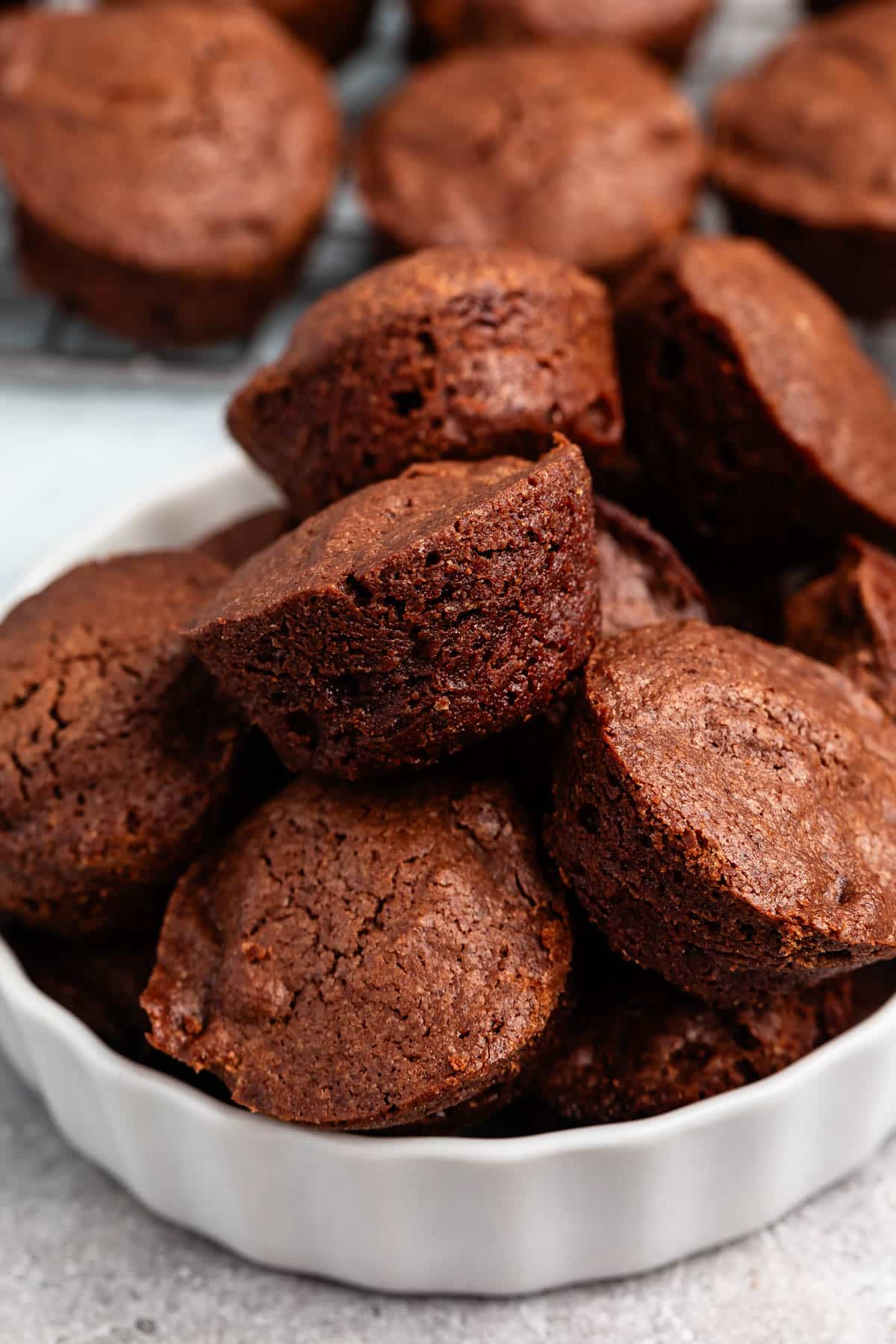 brownie bites layered on a drying wrack.