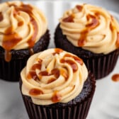 brown cupcake with caramel frosting on top.