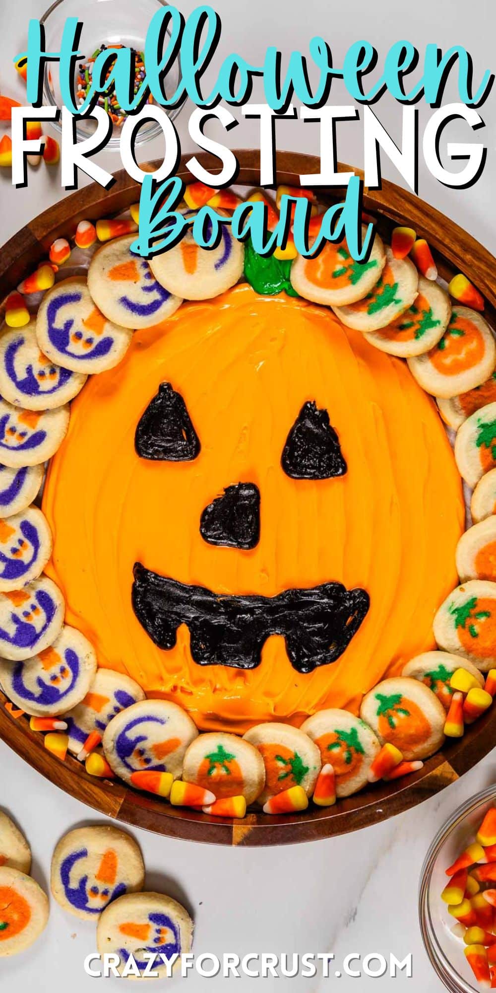 frosting board with pumpkin decorations and pumpkin cookies around it with words on the image.