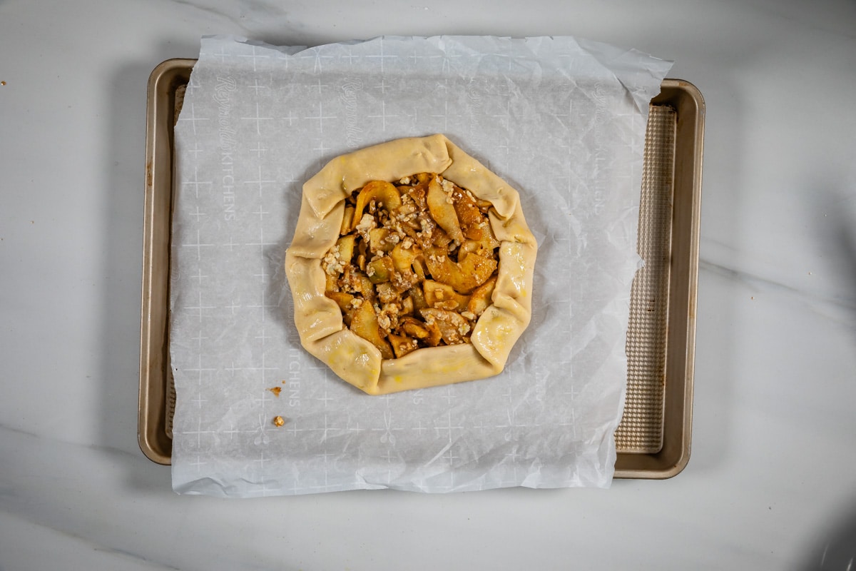 process shot of apple gorgonzola crostata.