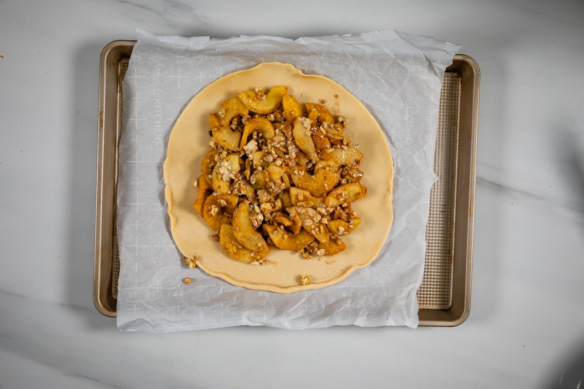 process shot of apple gorgonzola crostata.