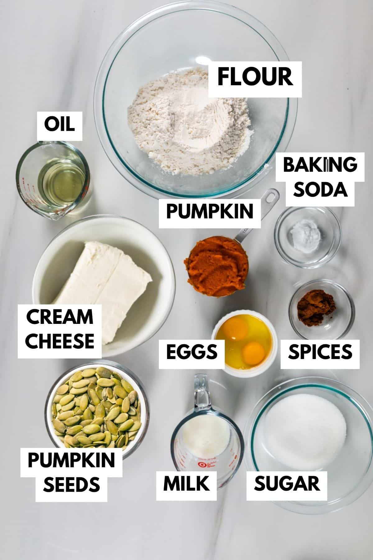 ingredients in pumpkin cream cheese muffins on counter.
