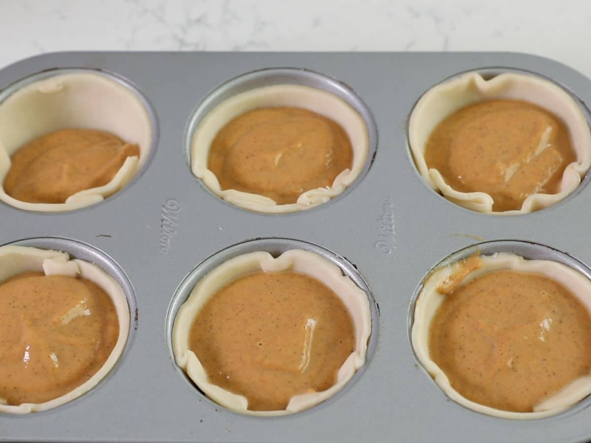 process shot of mini pumpkin pies.