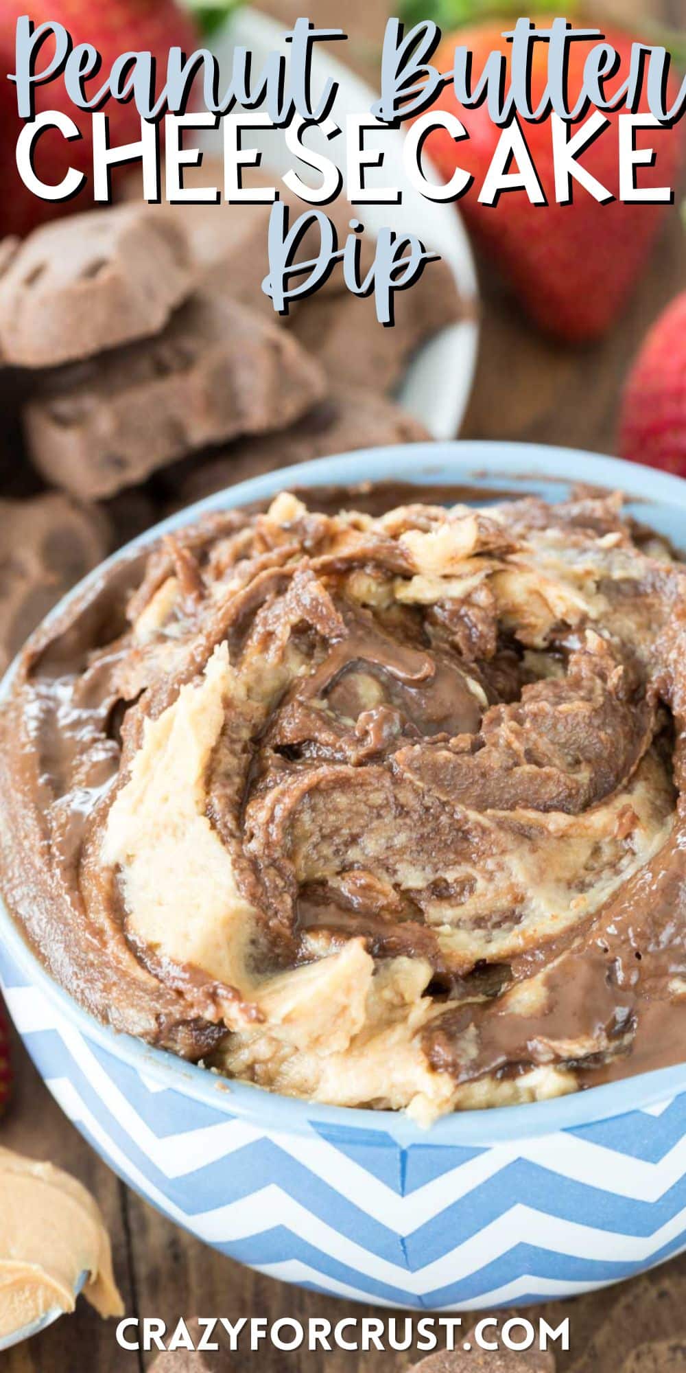 peanut butter and chocolate dip in a blue and white bowl with words on the image.