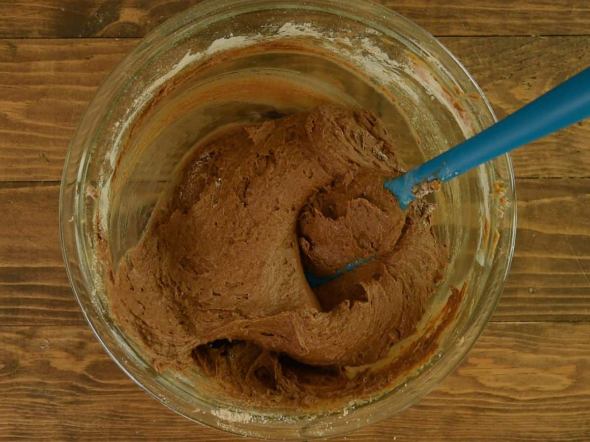 process shot of pumpkin brownie muffins.