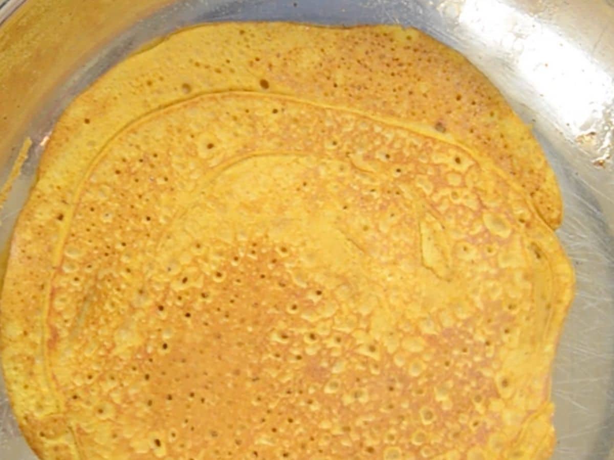 process shot of pumpkin pancake rolls.