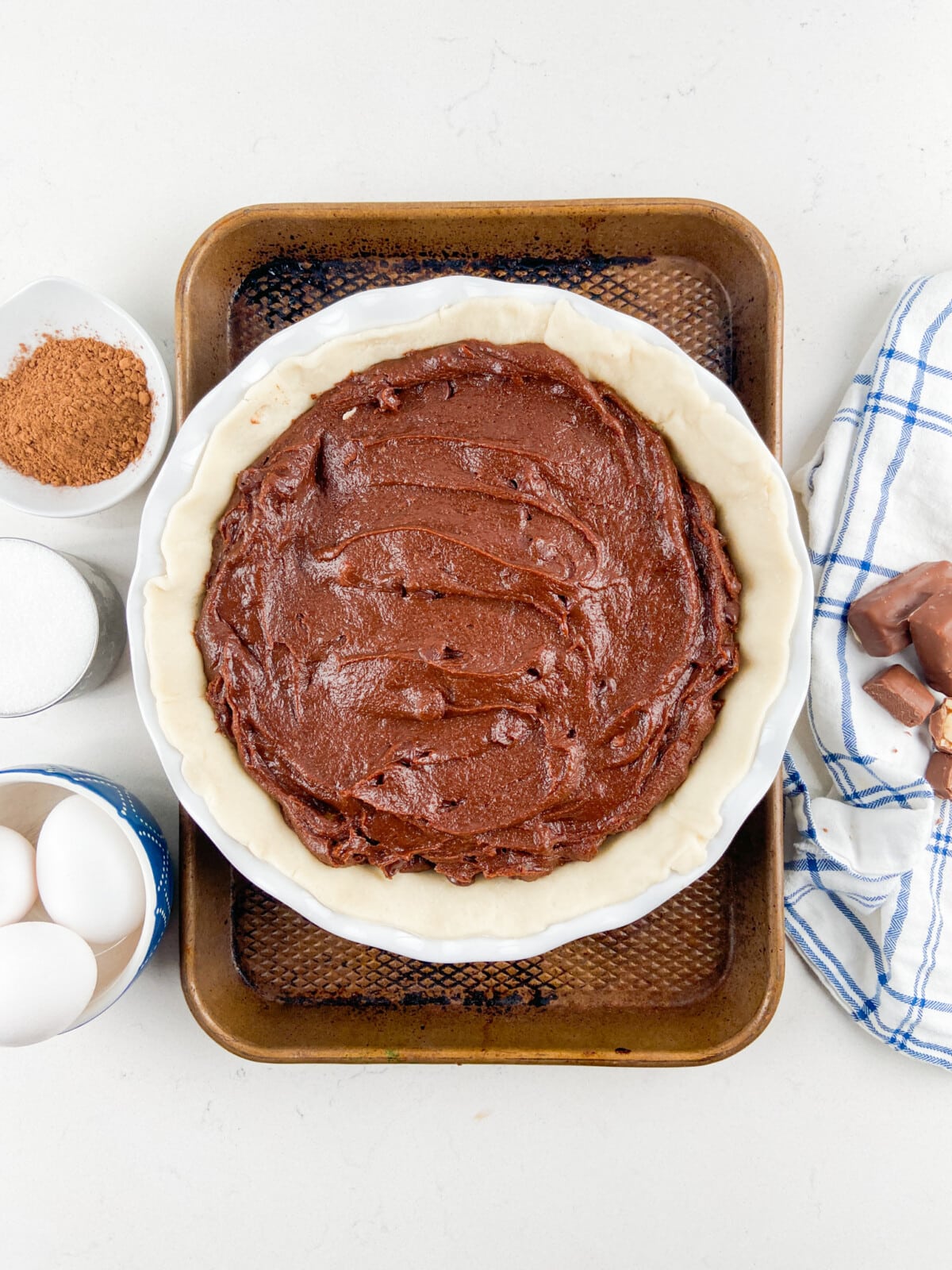 process shot of candy bar brownie pie.