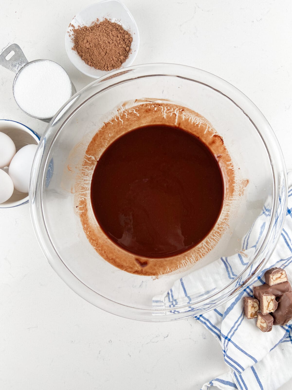 process shot of candy bar brownie pie.