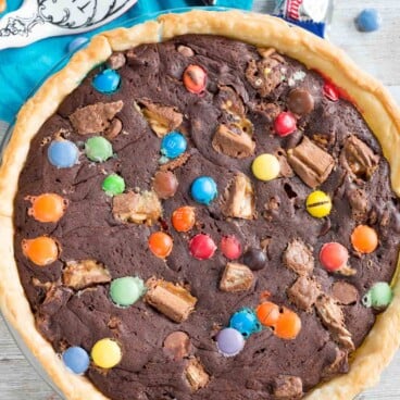 brownie pie with colorful m&ms and candy baked in.