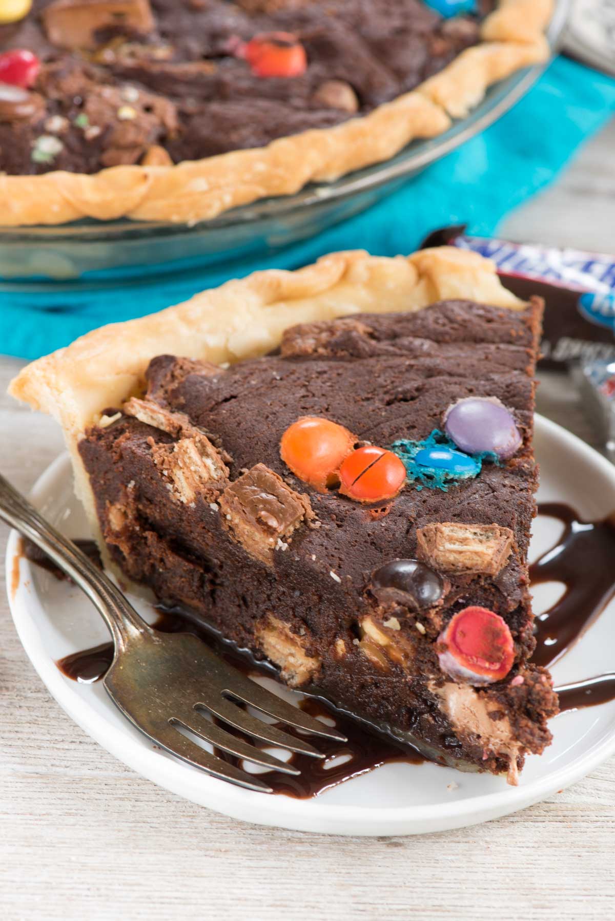 brownie pie with colorful m&ms and candy baked in.