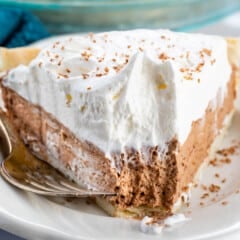 sliced French silk pie with one layer of chocolate and one layer of white.