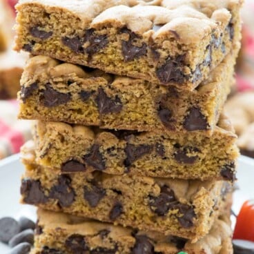 stacked pumpkin blondies with chocolate chips baked in.