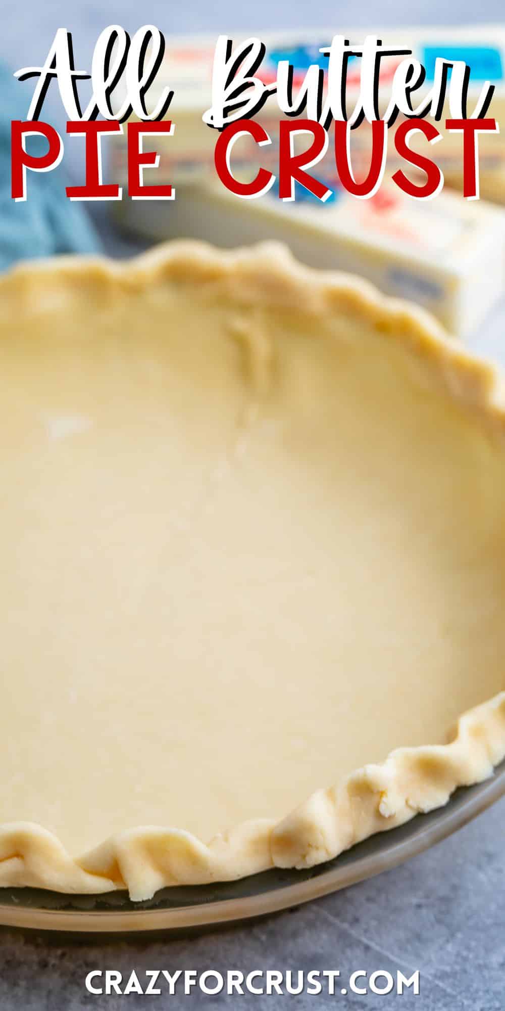 butter pie crust in a clear pan with words on the image.