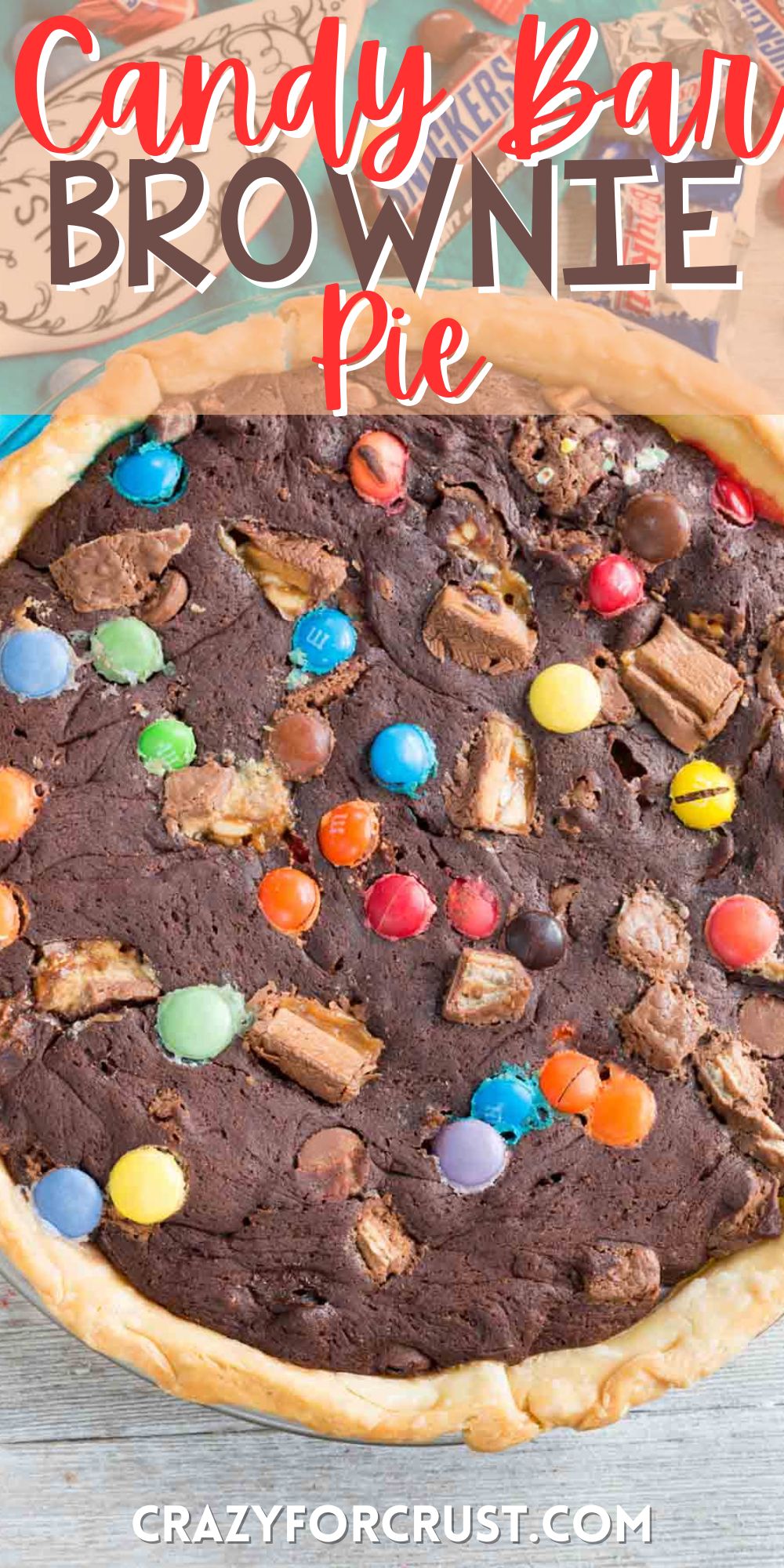brownie pie with colorful m&ms and candy baked in with words on the image.