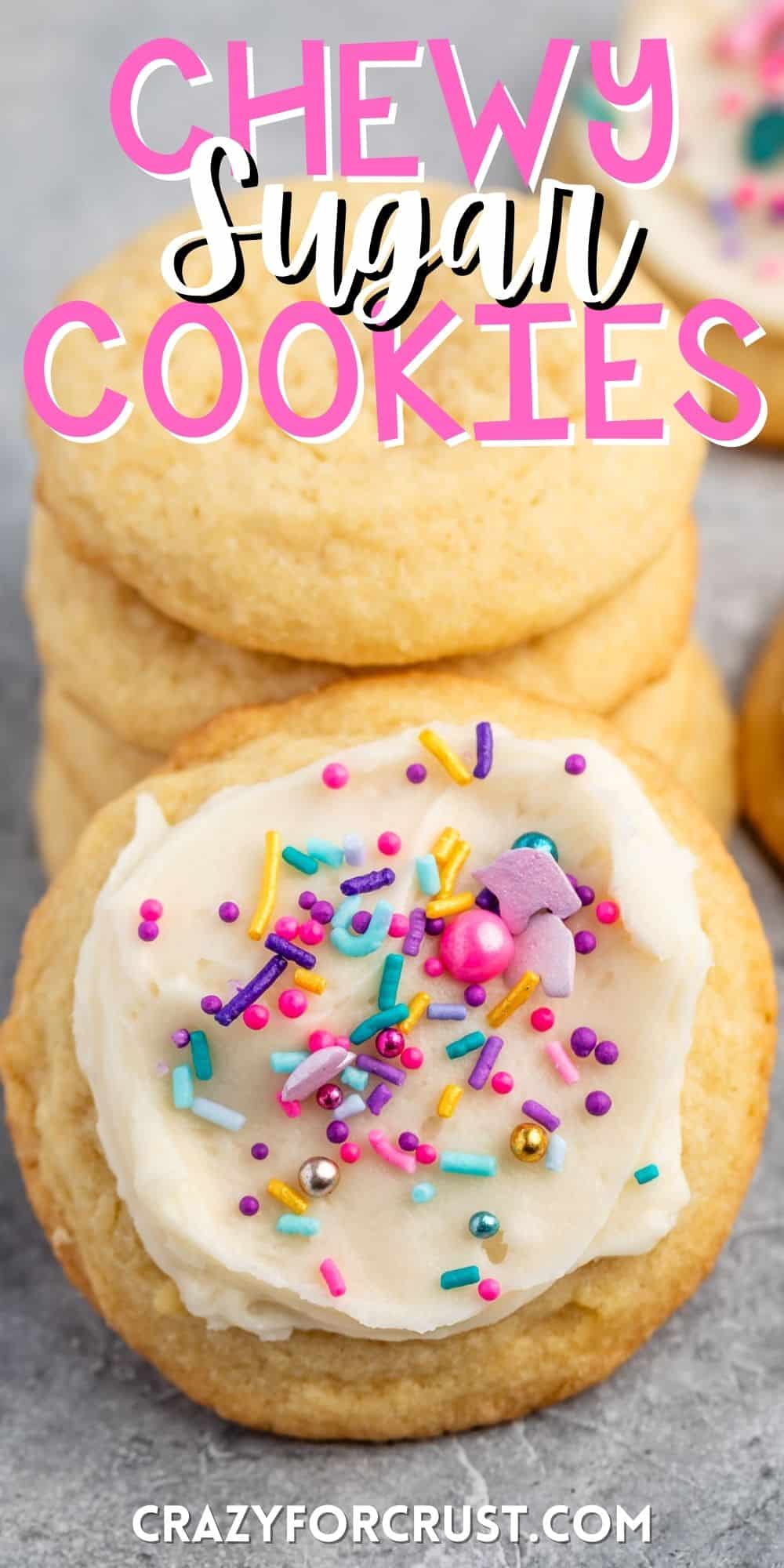 sugar cookie with white frosting and pink and blue sprinkles with words on the image.