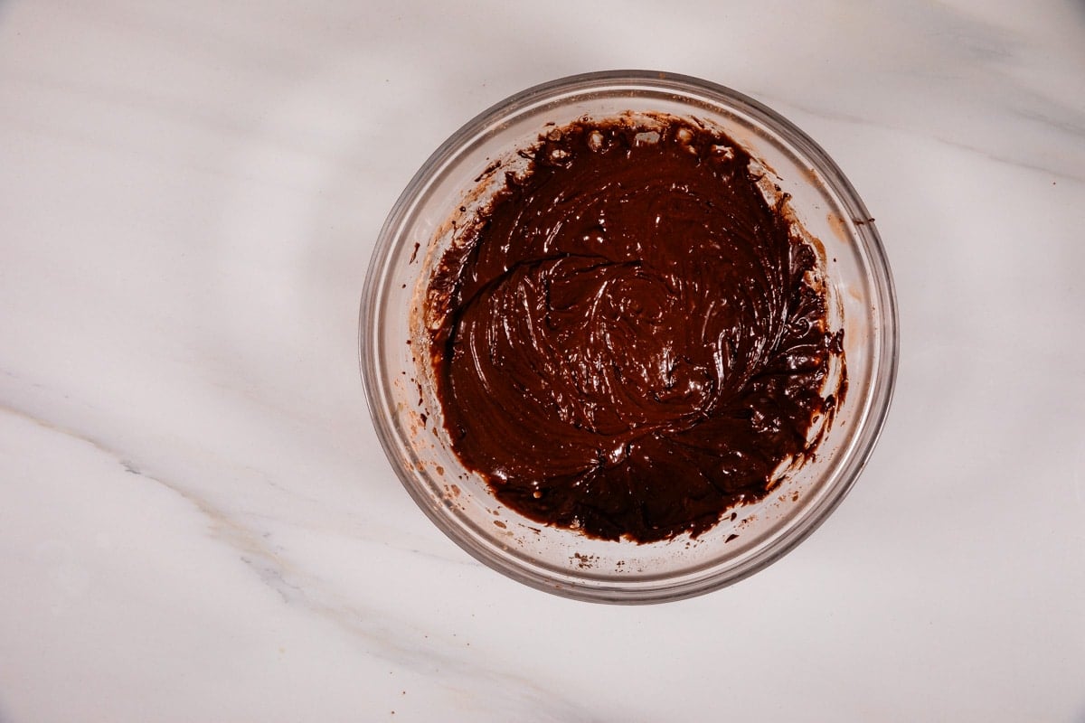 process shot of chocolate crinkle cookies.