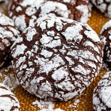 chocolate crinkle cookies covered in powdered sugar.