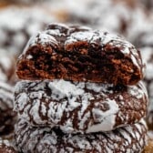 chocolate crinkle cookies covered in powdered sugar.