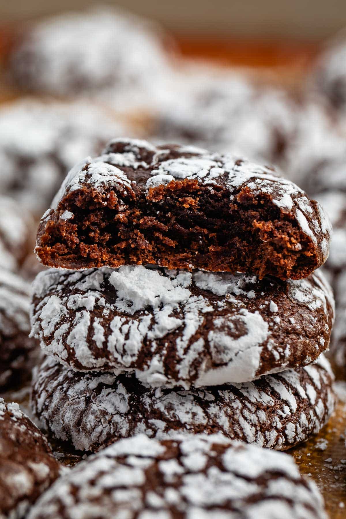 chocolate crinkle cookies covered in powdered sugar.