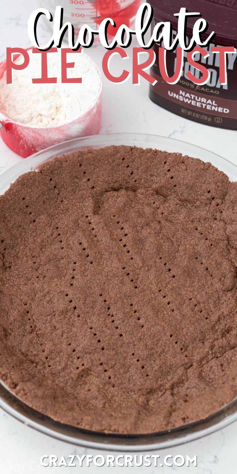 chocolate pie crust in a clear pie plate with words on the image.