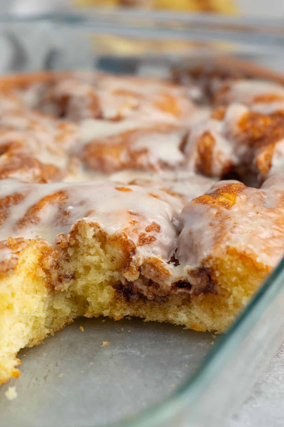 cinnamon roll baked into a clear pan.