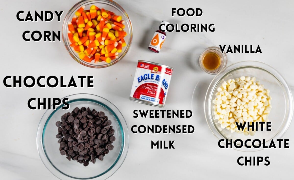 ingredients in halloween fudge laid on a marble counter.