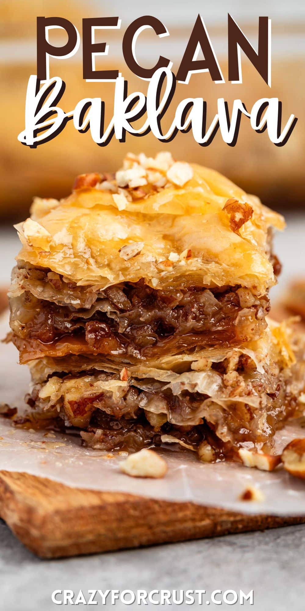 stacked baklava with pecans layered in it with words on the image.